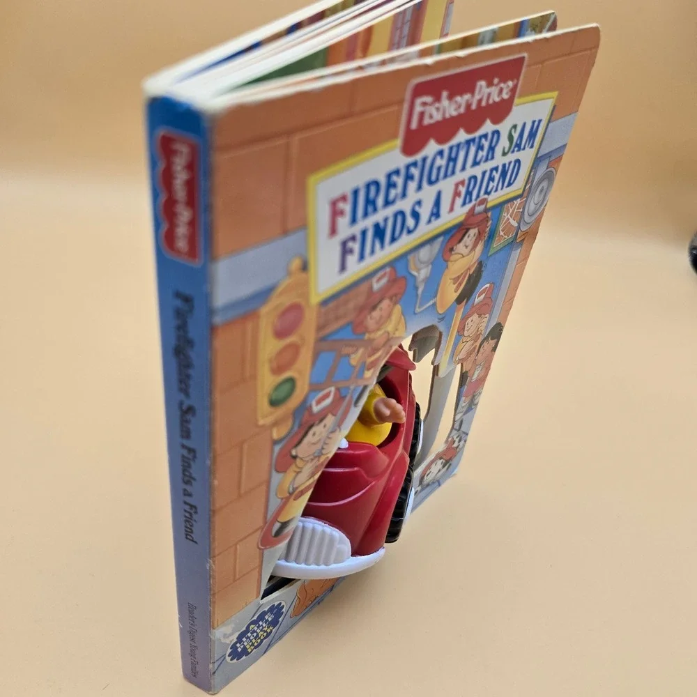 Fisher-Price Little People Firefighter Sam Finds a Friend Board Book Toy 1997